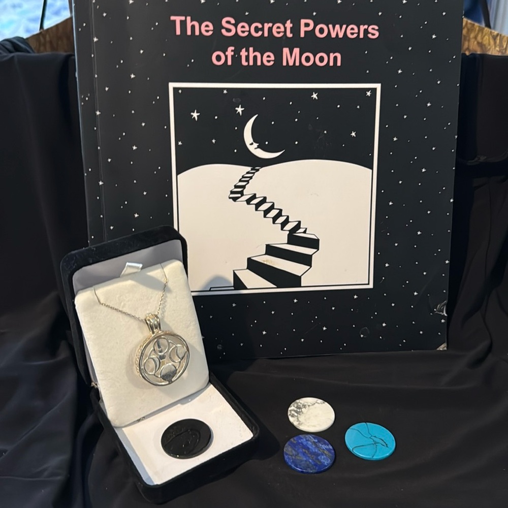 Moon phases necklace and book